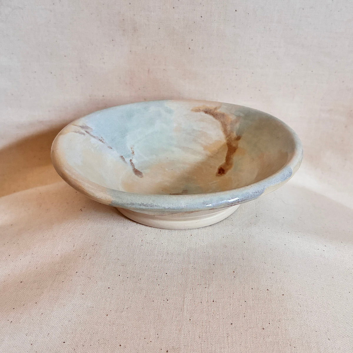 Cream, ice blue and russet orange Bubble Bowl evoking a koi pond