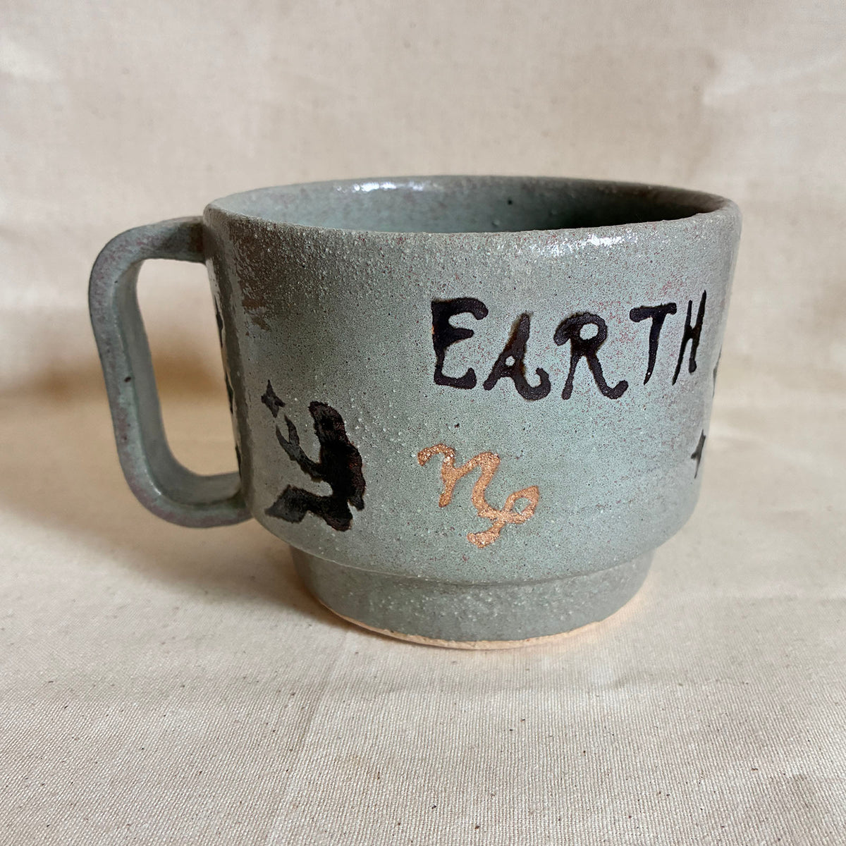 Big Diner Mug: Earth Signs with sage glaze and Earth lettering