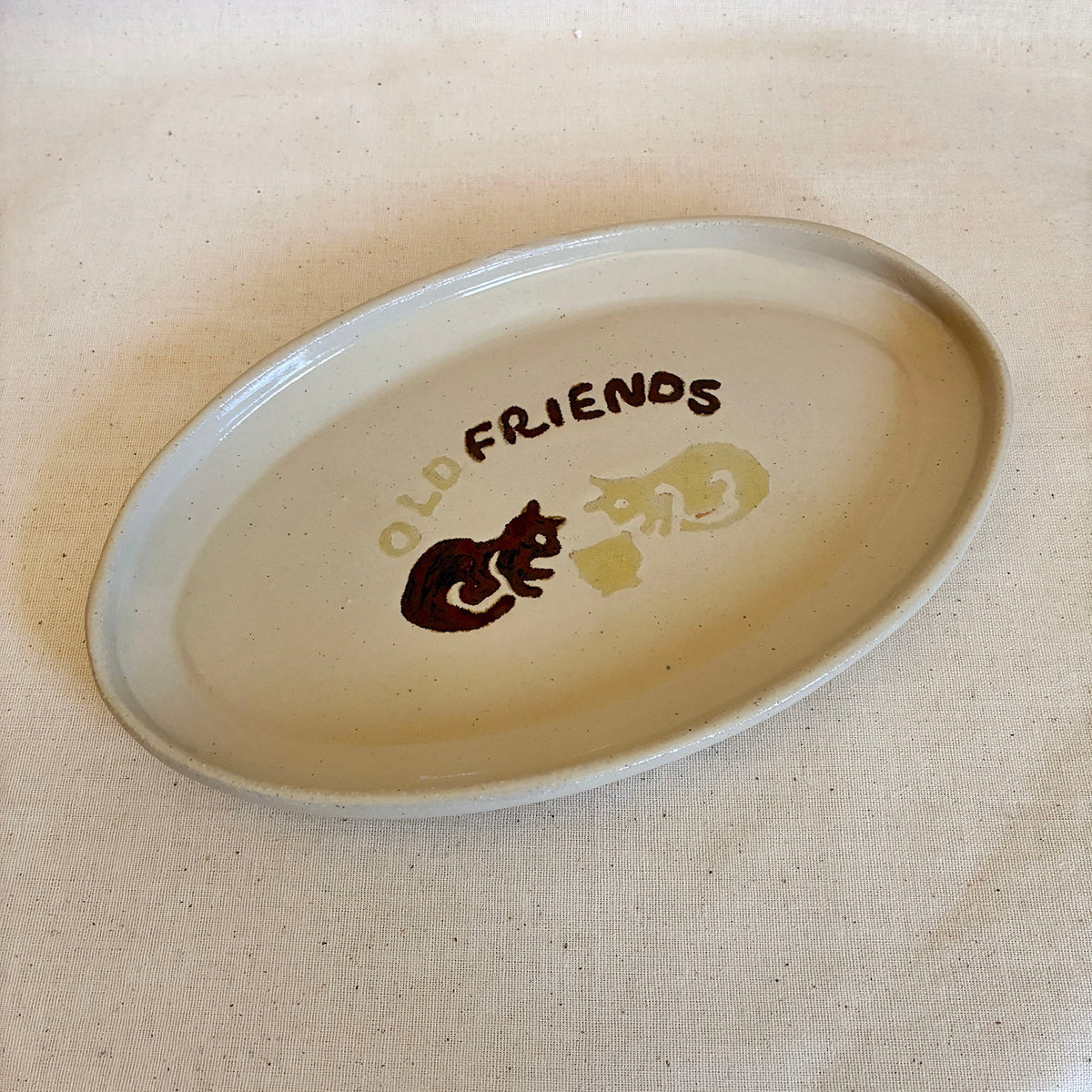 Cream oval platter tray with brown and yellow cat decoration and FRIENDS lettering