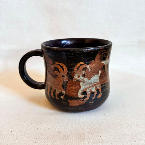 Tenmoku-brown Cauldron Mug with goat and spiral designs