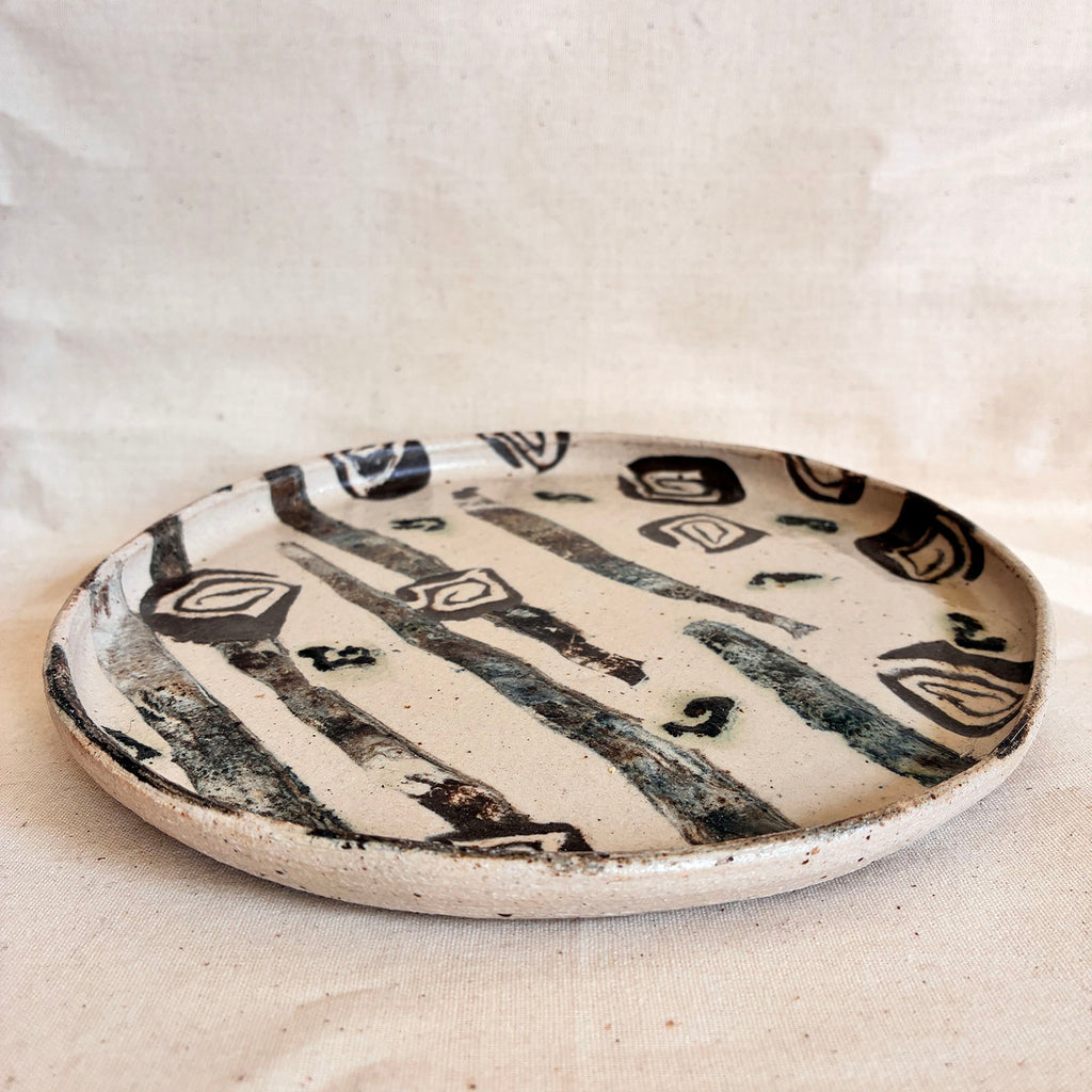 Rimmed Tree Rings plate with striped and spiral inlay
