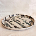 Rimmed Tree Rings plate with striped and spiral inlay
