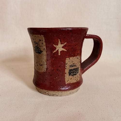 Russet diner mug on lava-fleck clay with Water-Clay-Flame transfer graphics